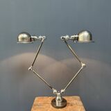 Unique double two-arm polished Jielde table lamp