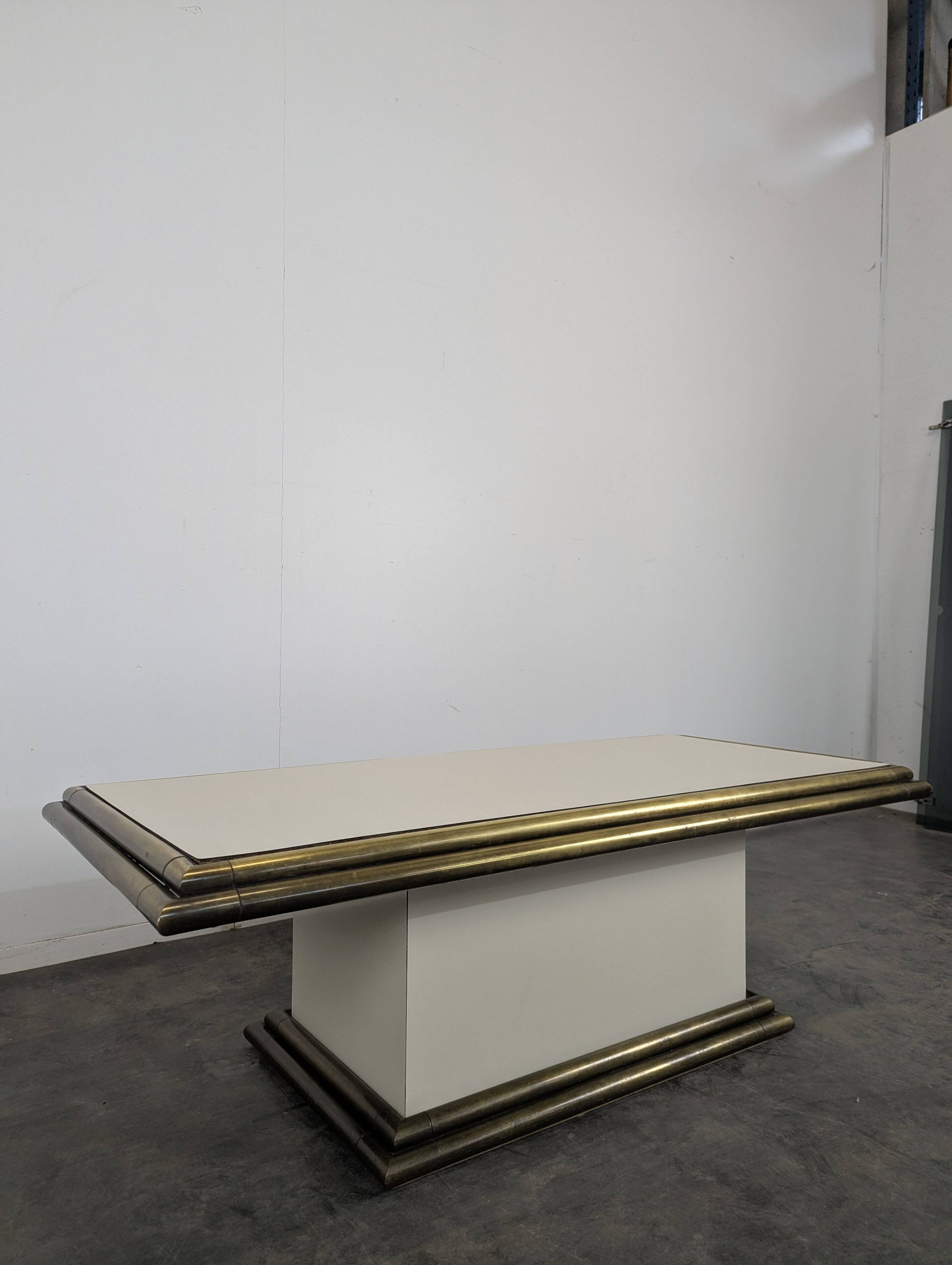 1980s coffee table made of brass tubes and laminate.