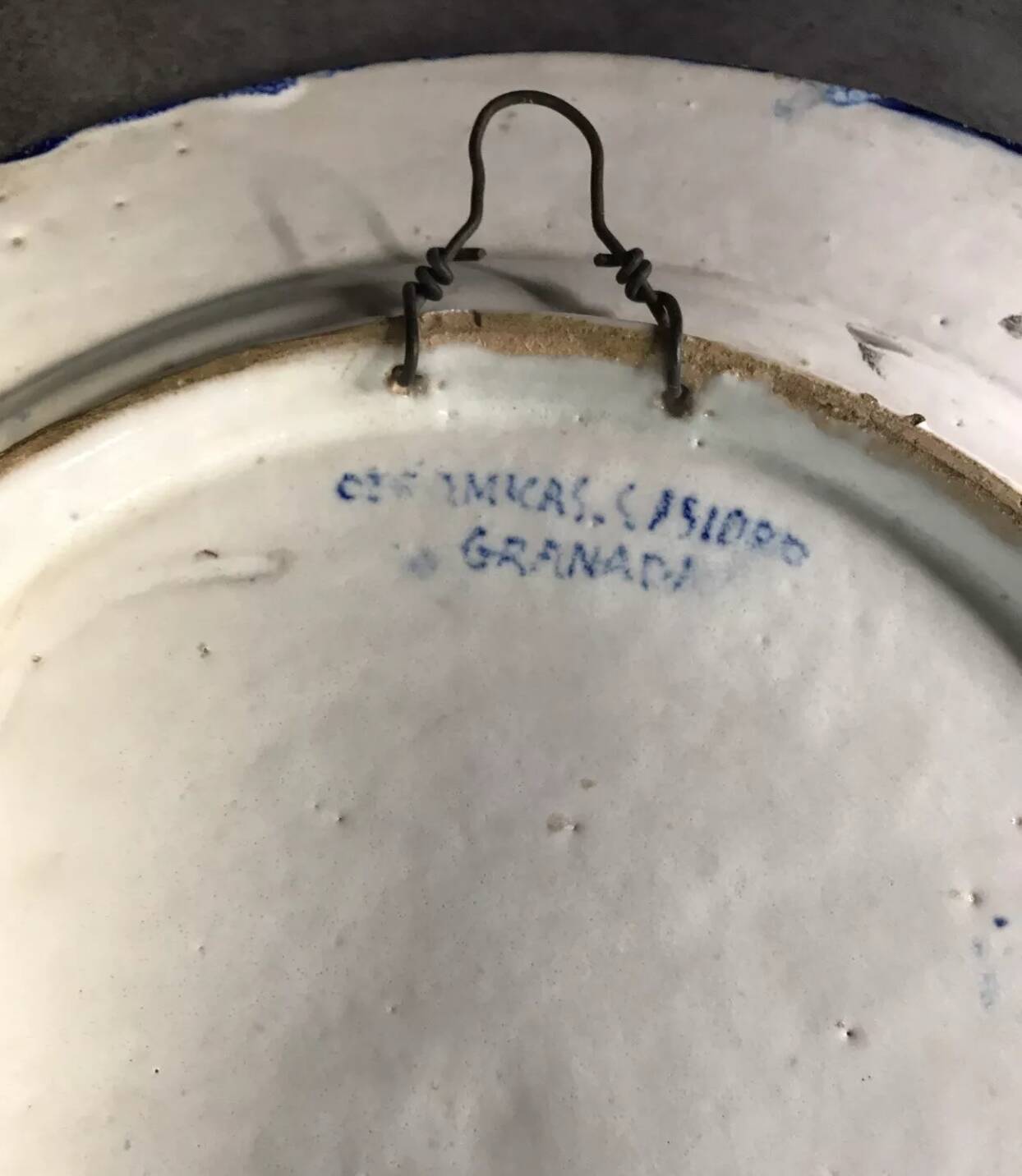 Antique glazed ceramic wall plate with battle scene decoration 41.5 cm