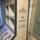 Store display for whisky and rum in metal and melamine