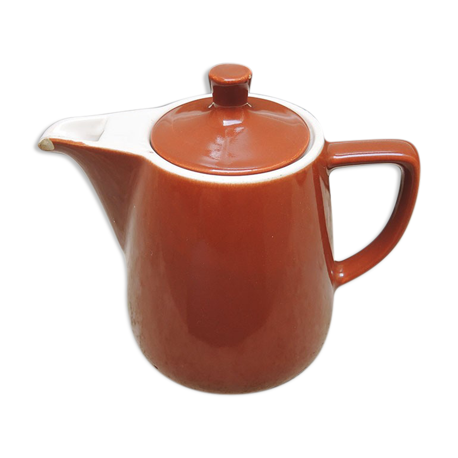 Old brown ceramic coffee maker