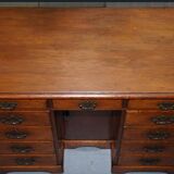 Small Victorian desk in solid walnut with drawers.
