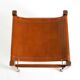 Rare 1990s safari stool with a teak frame and a seat made of brown saddle l