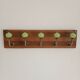 Wall-mounted coat rack in wood and sage green ceramic – 5 hooks – 50 cm
