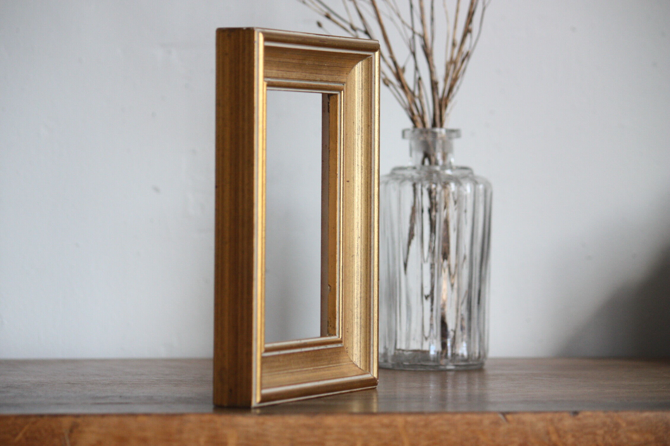 Moulded gilded wood frame