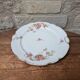 Porcelain plate with floral decoration, gilding, and relief MR France 25.5cm