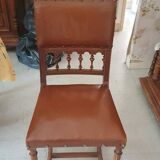 Chaise ancienne en bois et assise en cuir marron