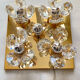 Brass wall lamp with glass prisms