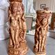 Two ancient Indonesian candlesticks.