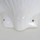 Pair of shell wall lights, in white ceramic. 80s 90s