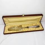 Silver metal pie shovel