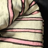 Vintage Berber blanket in neon pink, black and cream striped wool