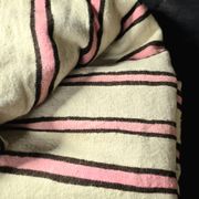 Vintage Berber blanket in neon pink, black and cream striped wool