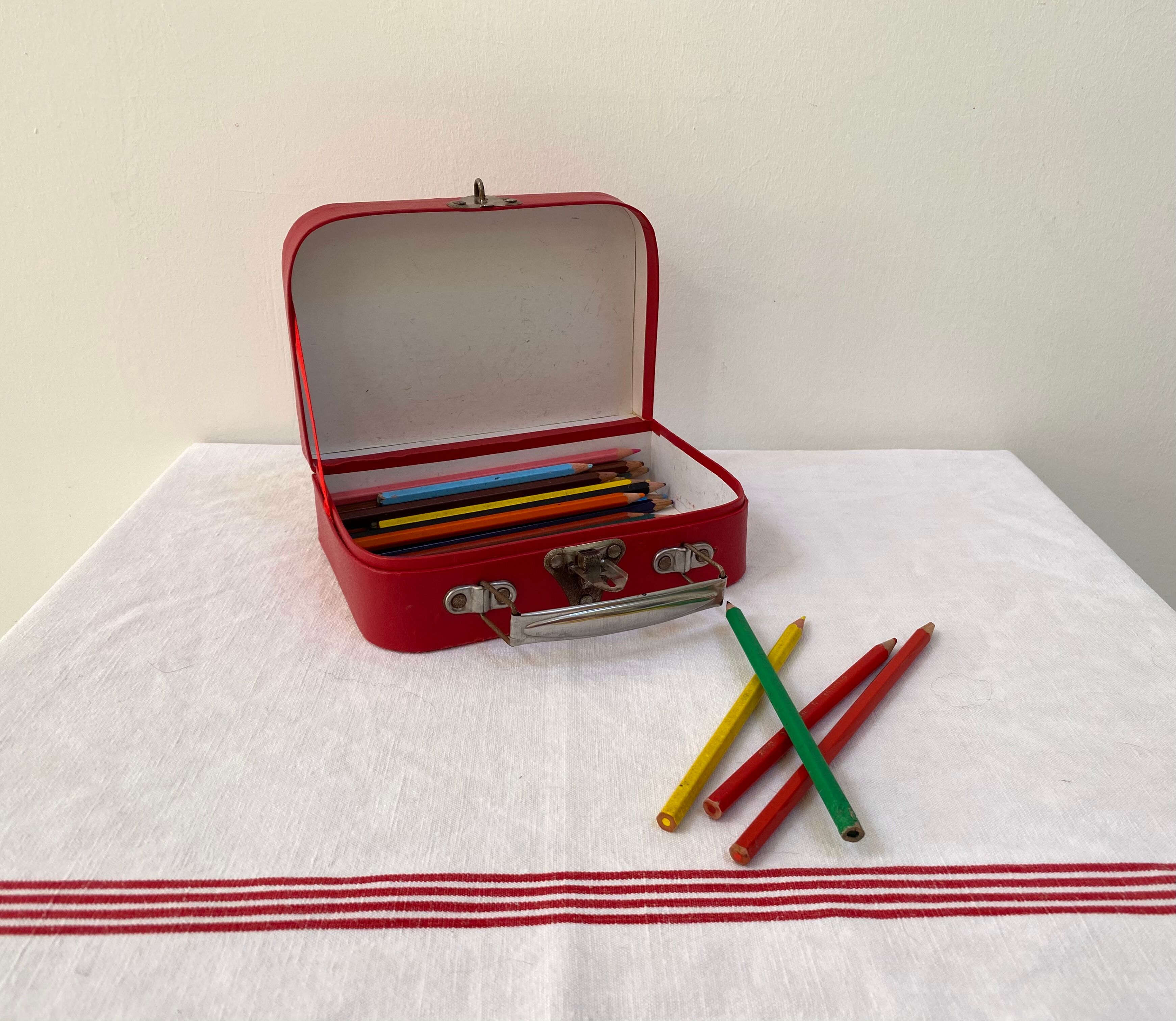 Red suitcase from the 60s