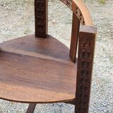 Set of three brutalist tripod armchairs in carved solid oak