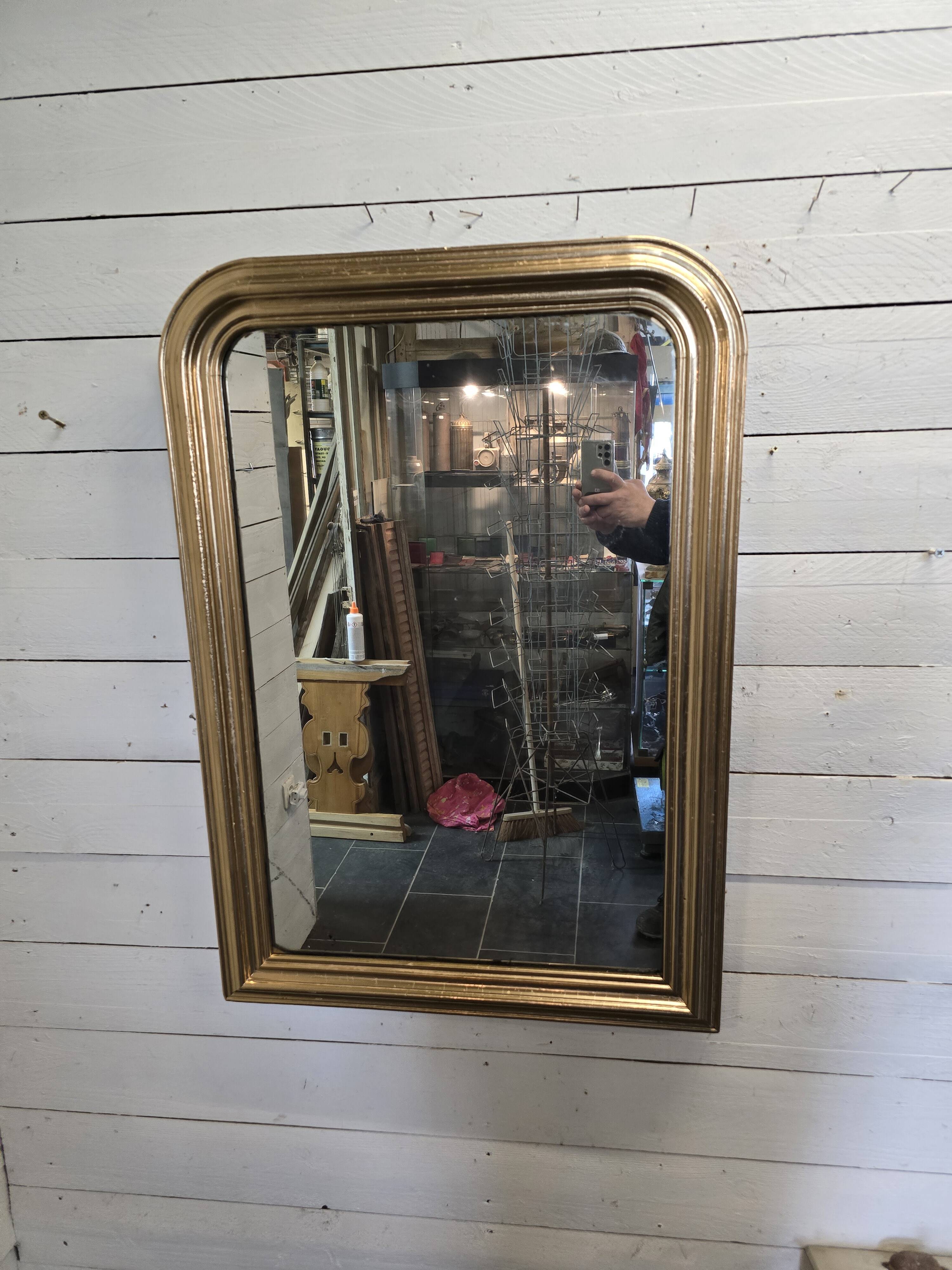 Old Louis Philippe style gilded mirror with mercury mirror