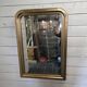 Old Louis Philippe style gilded mirror with mercury mirror