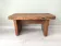 Small rustic wooden bench
