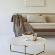Anatole Coffee table in terrazzo and confetti metal by the brand Tikamoon.