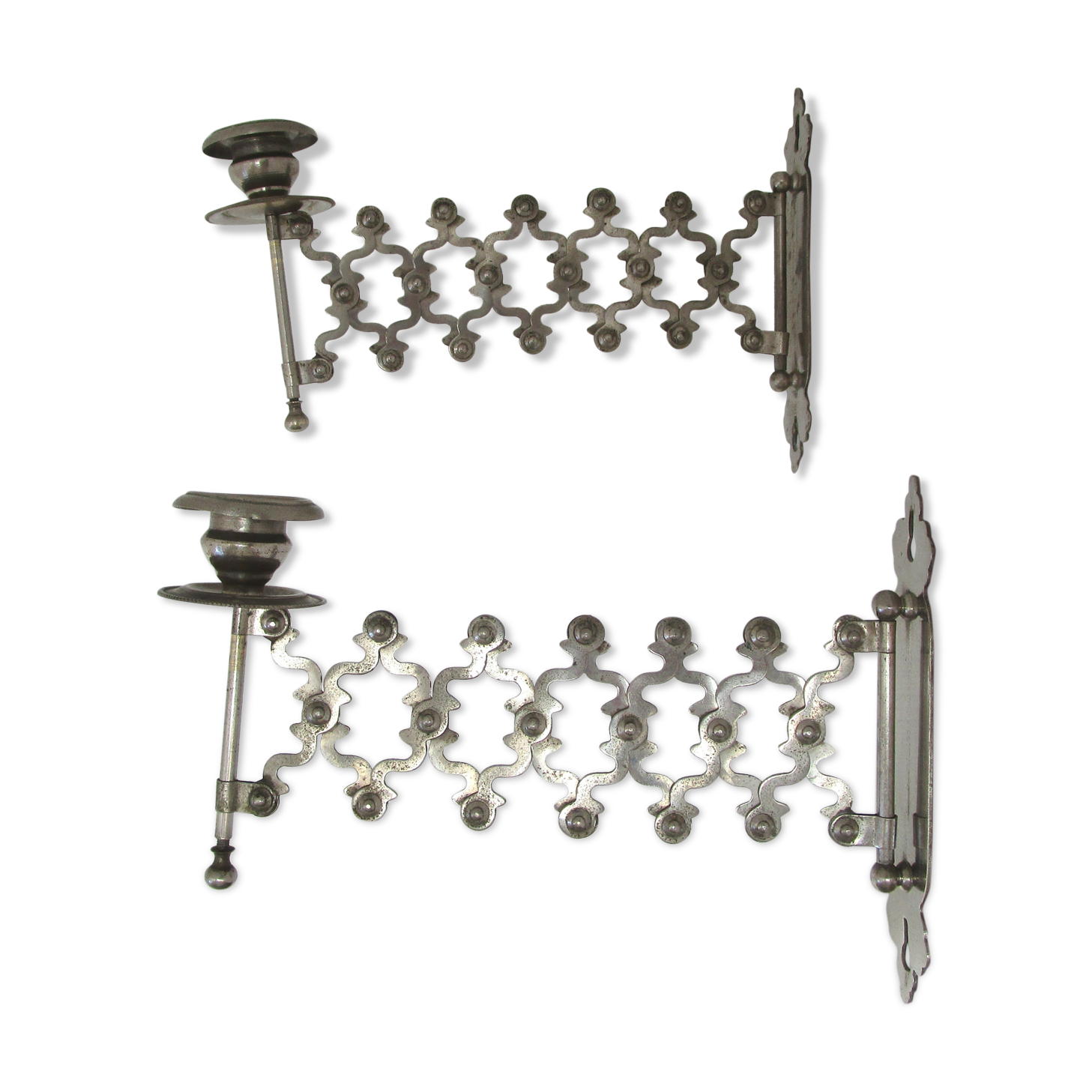 Pair of extendable old metal candlesticks