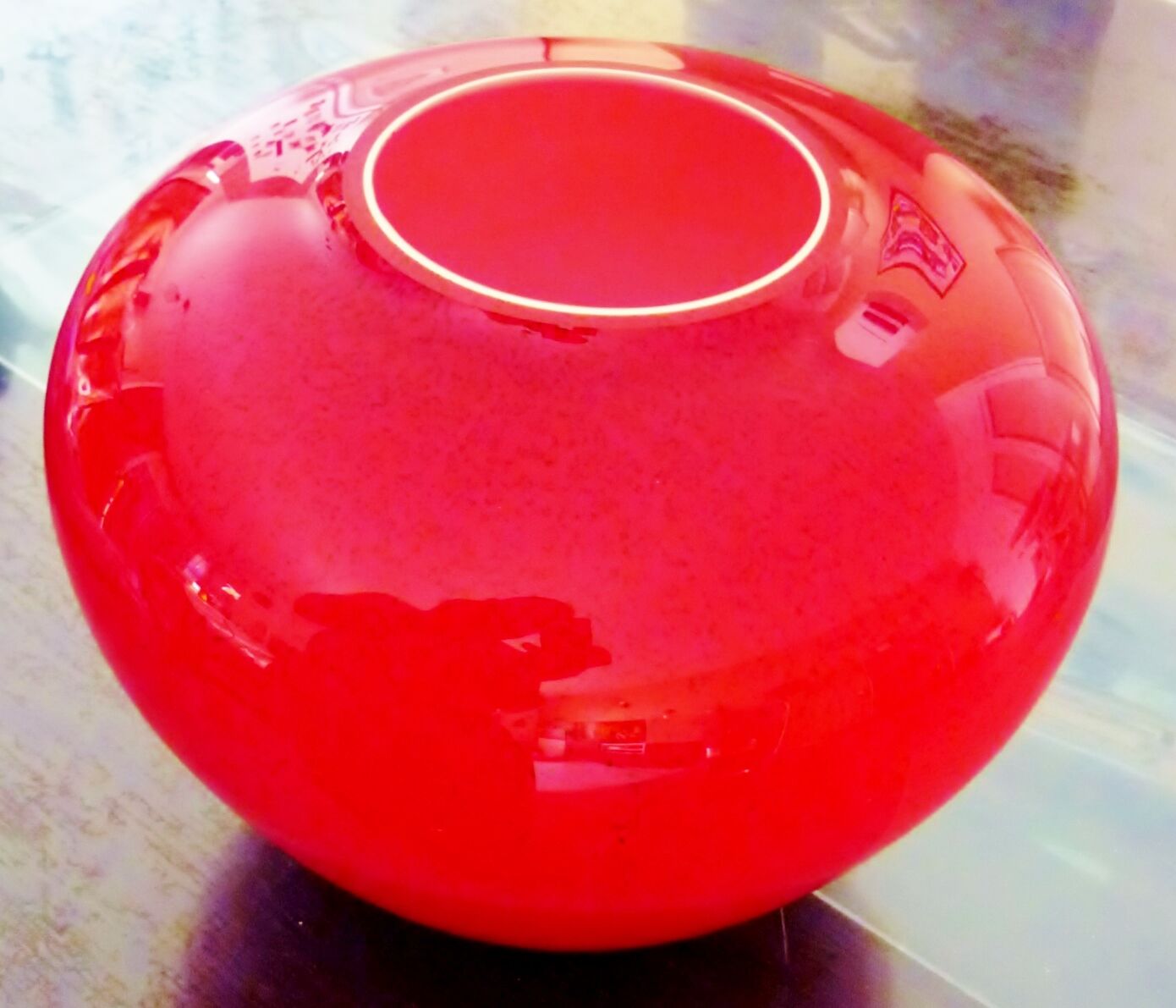 Pot-bellied, art deco vase in speckled ruby red multi-layered glass, white interior