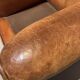 Brown leather armchair