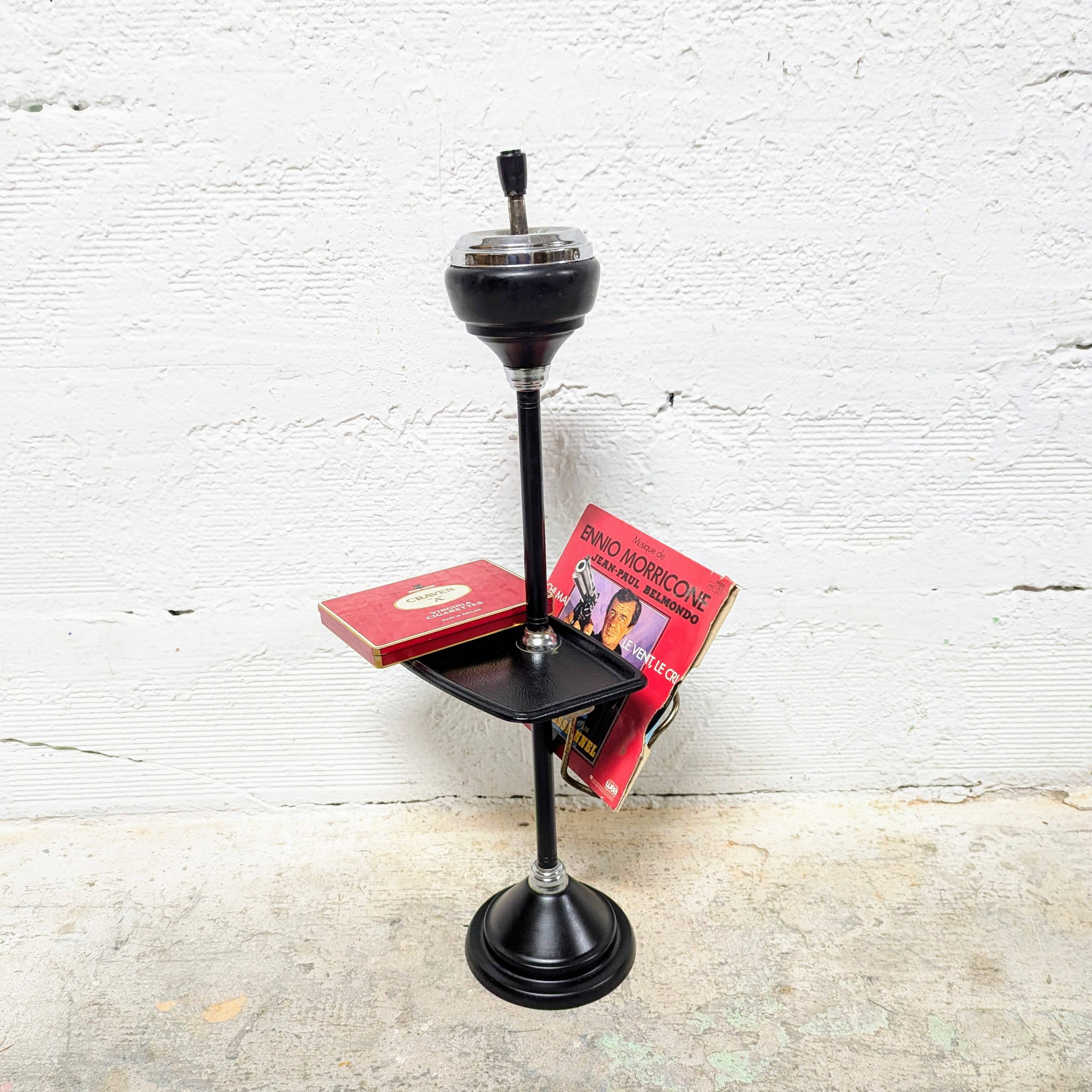 Standing ashtray with magazine rack