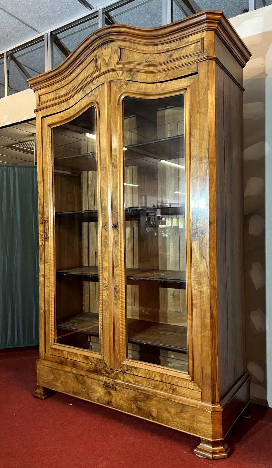 Library with gendarme's hat Louis Philippe era in blond walnut around 1830