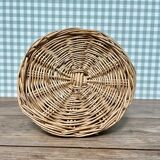 Round basket with vintage rattan handle