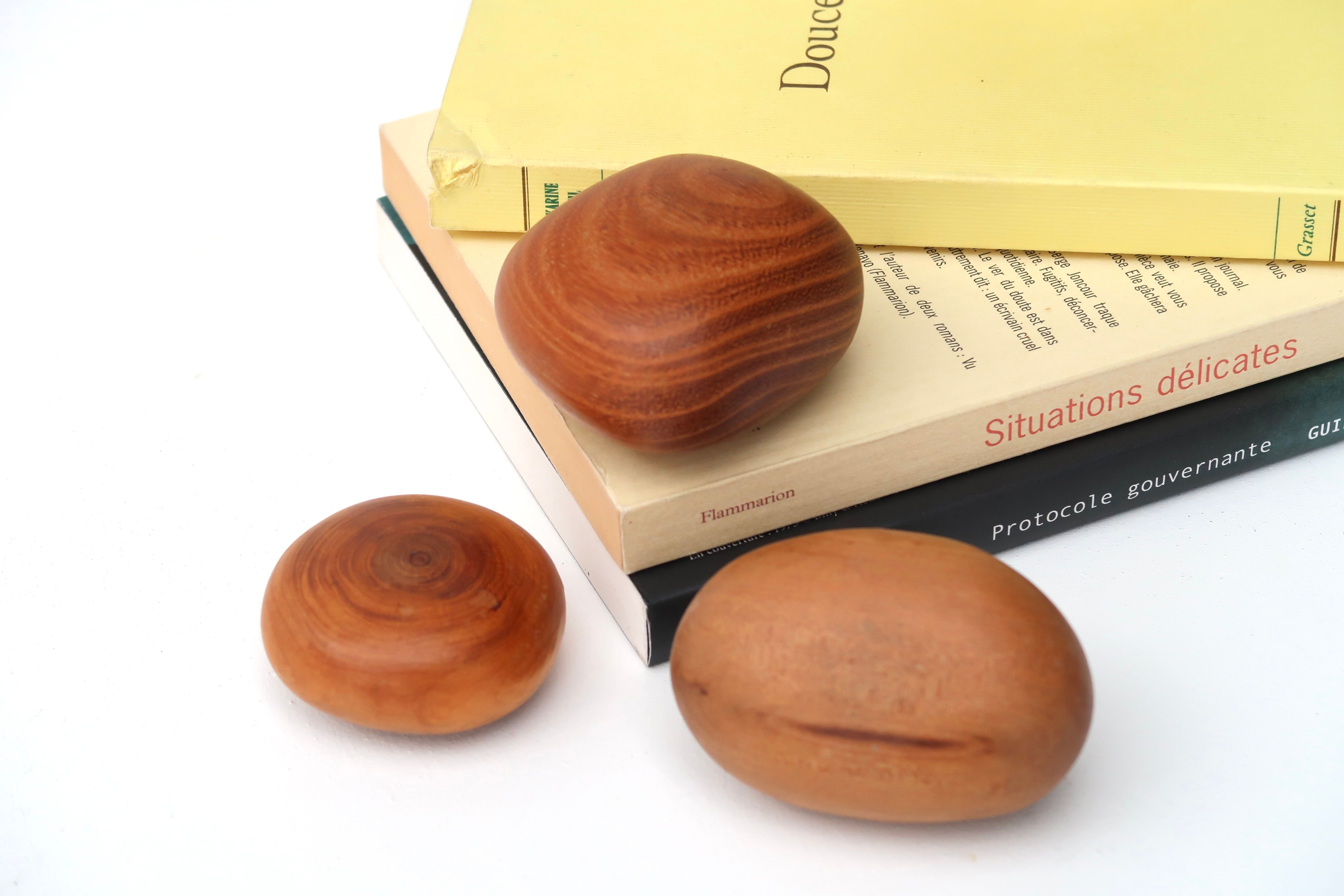 Wooden "pebble" paperweight, 70s
