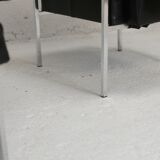 Pair of stainless steel, black leather-like armchairs, France, circa 1970