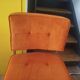 Pair of vintage cantilever chairs in chrome and orange corduroy.