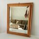 Miroir doré vintage à glace biseautée