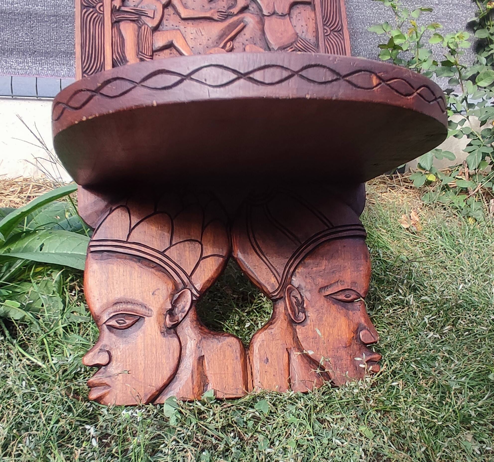 Old African wooden carved talking chair.