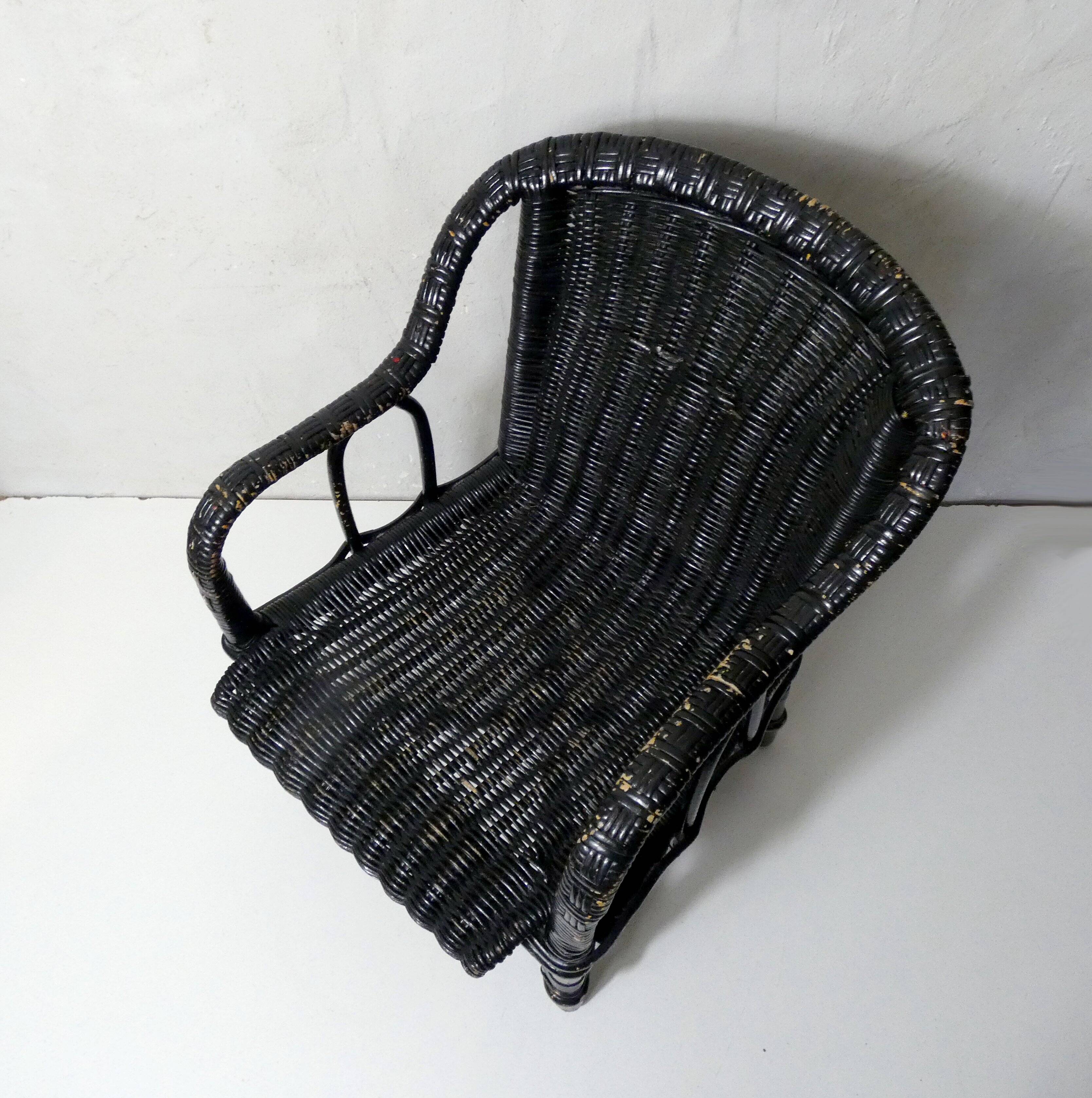 Vintage children's size rattan armchair