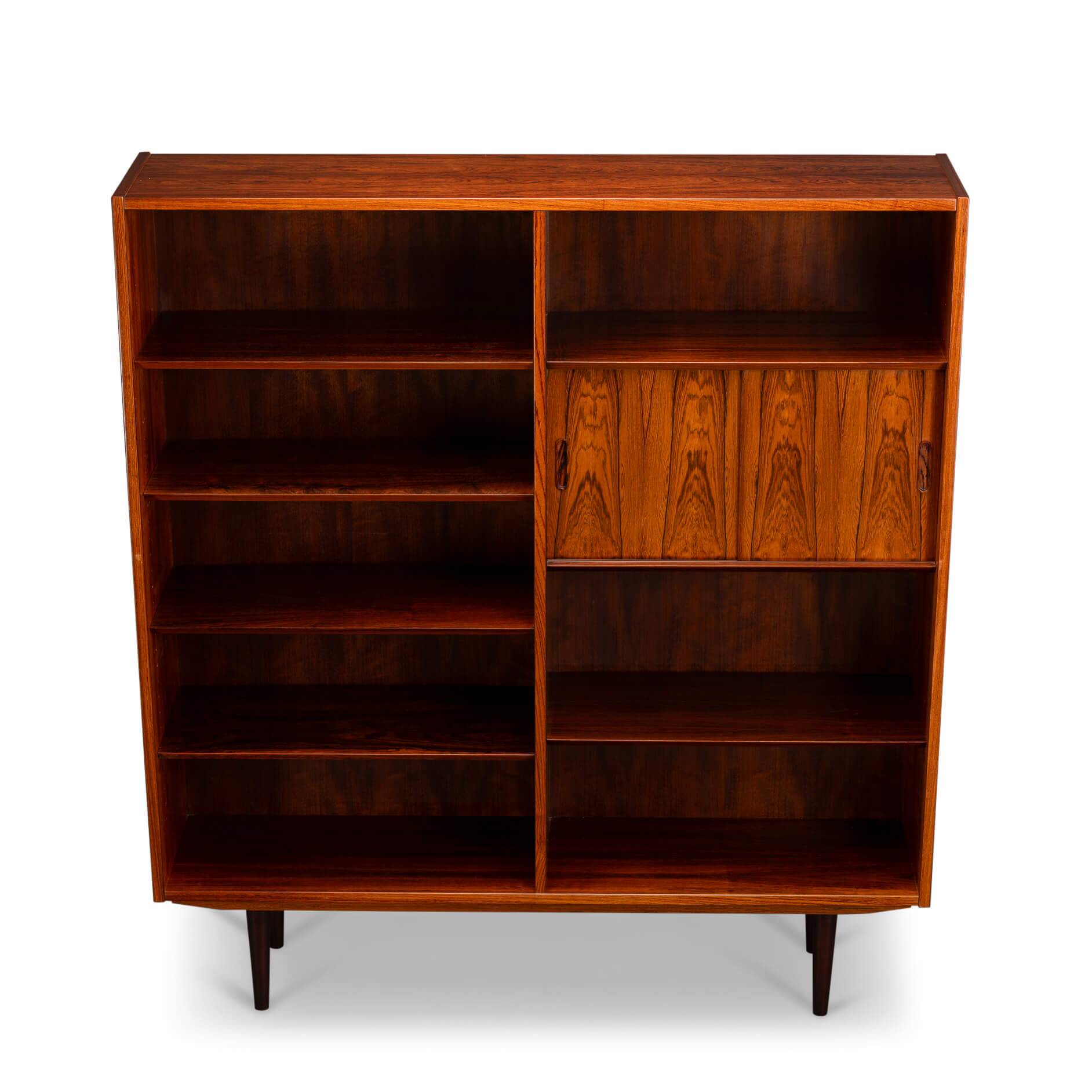 Rosewood library designed by Danish designers with doors by Hundevad & Co, 1960s.