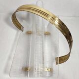 Revistero de metacrilato y latón. España, 1980s.