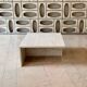 Square travertine coffee table by Giusti and Di Rosa for UP&UP.