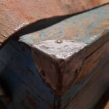 Old wooden trunk with blue patina