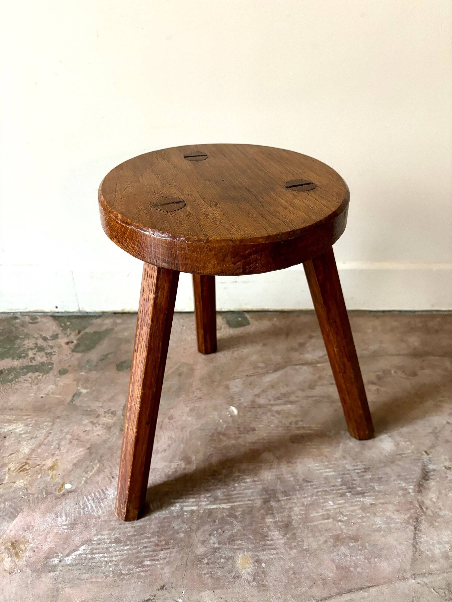 Dark wood tripod stool