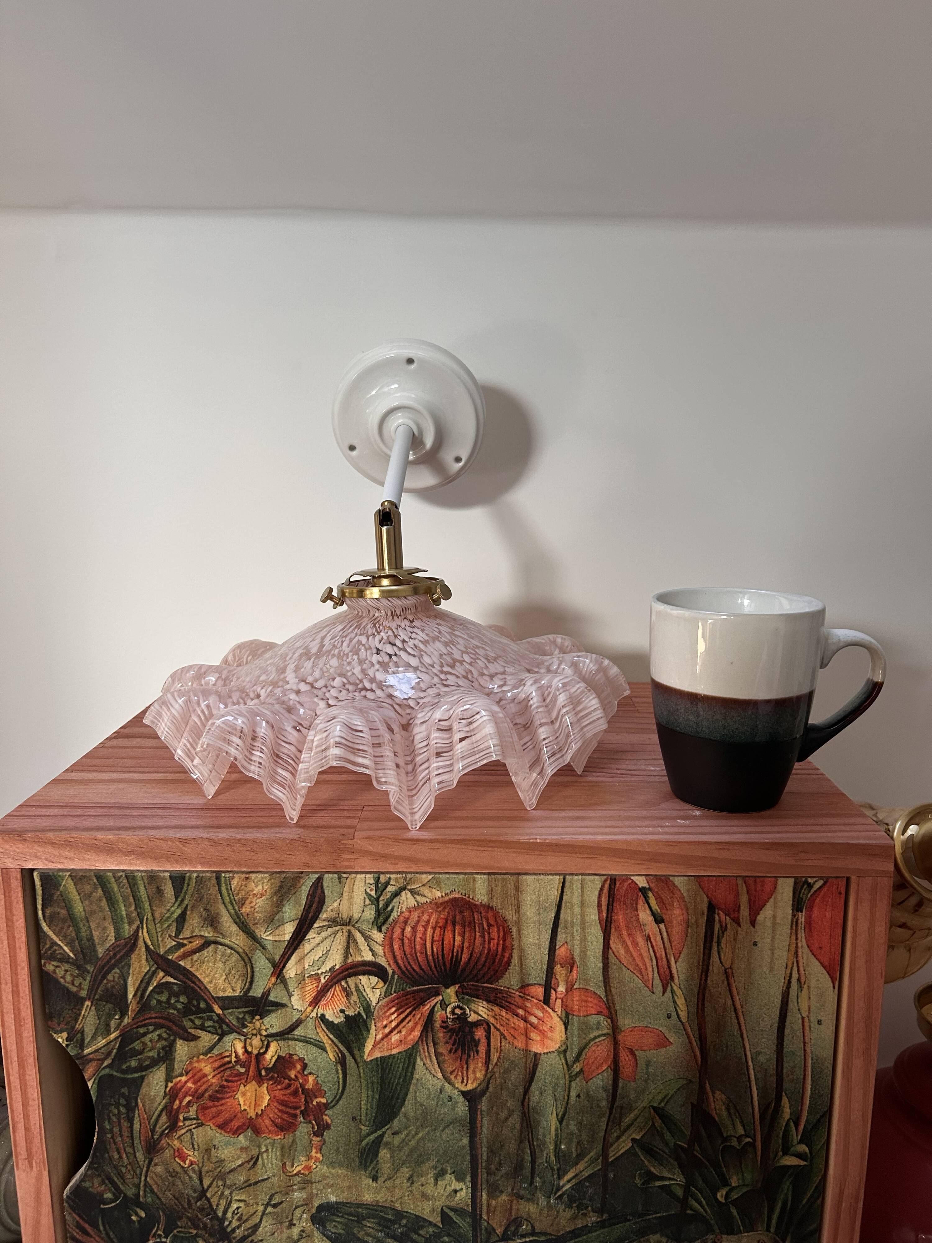 Pink Clichy glass tilting wall light