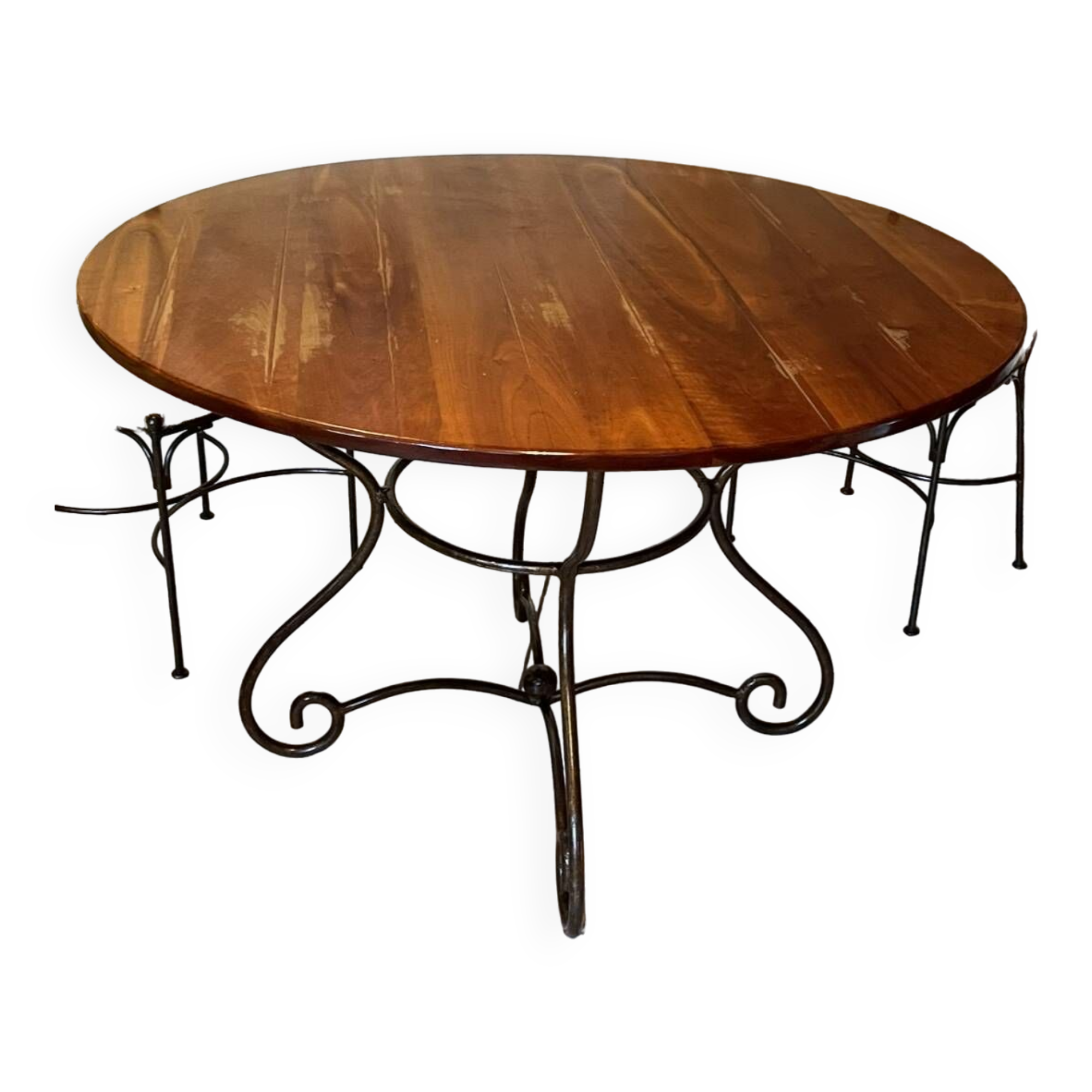 Table and four wrought iron and wood chairs.