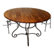 Table and four wrought iron and wood chairs.