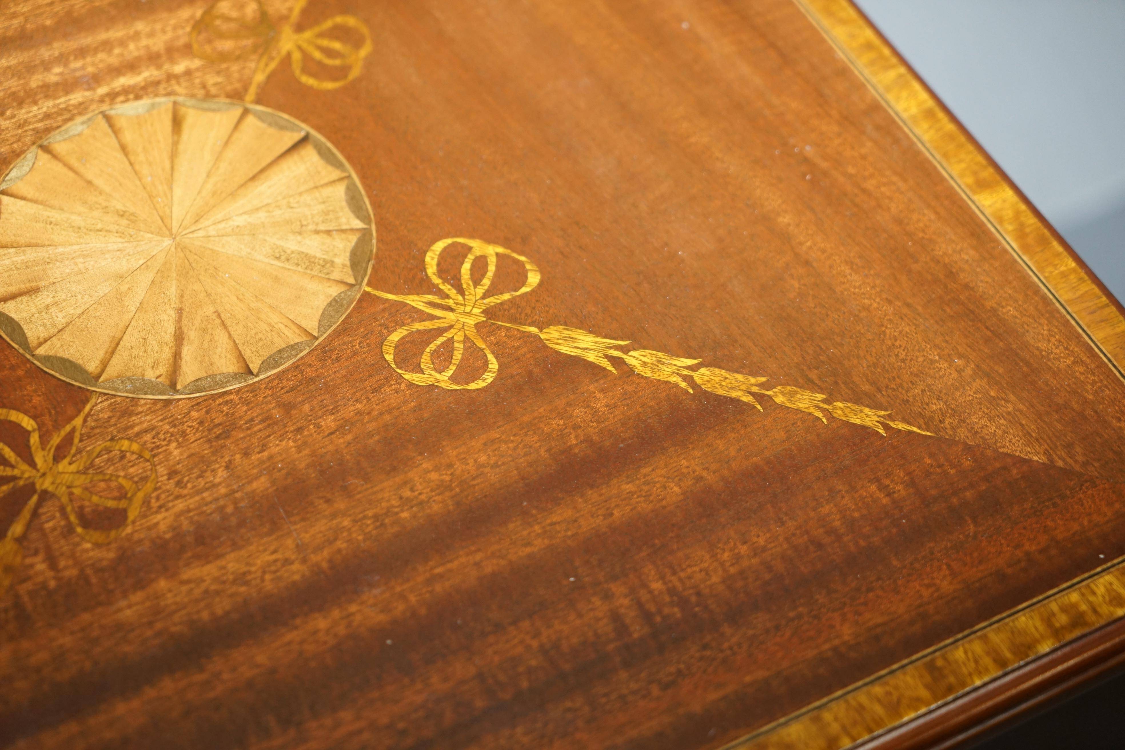 Edwardian burr walnut revolving bookcase with Sheraton inlays circa 1900