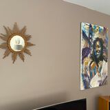 Sun mirror in braided rattan. 1960. 50cm.