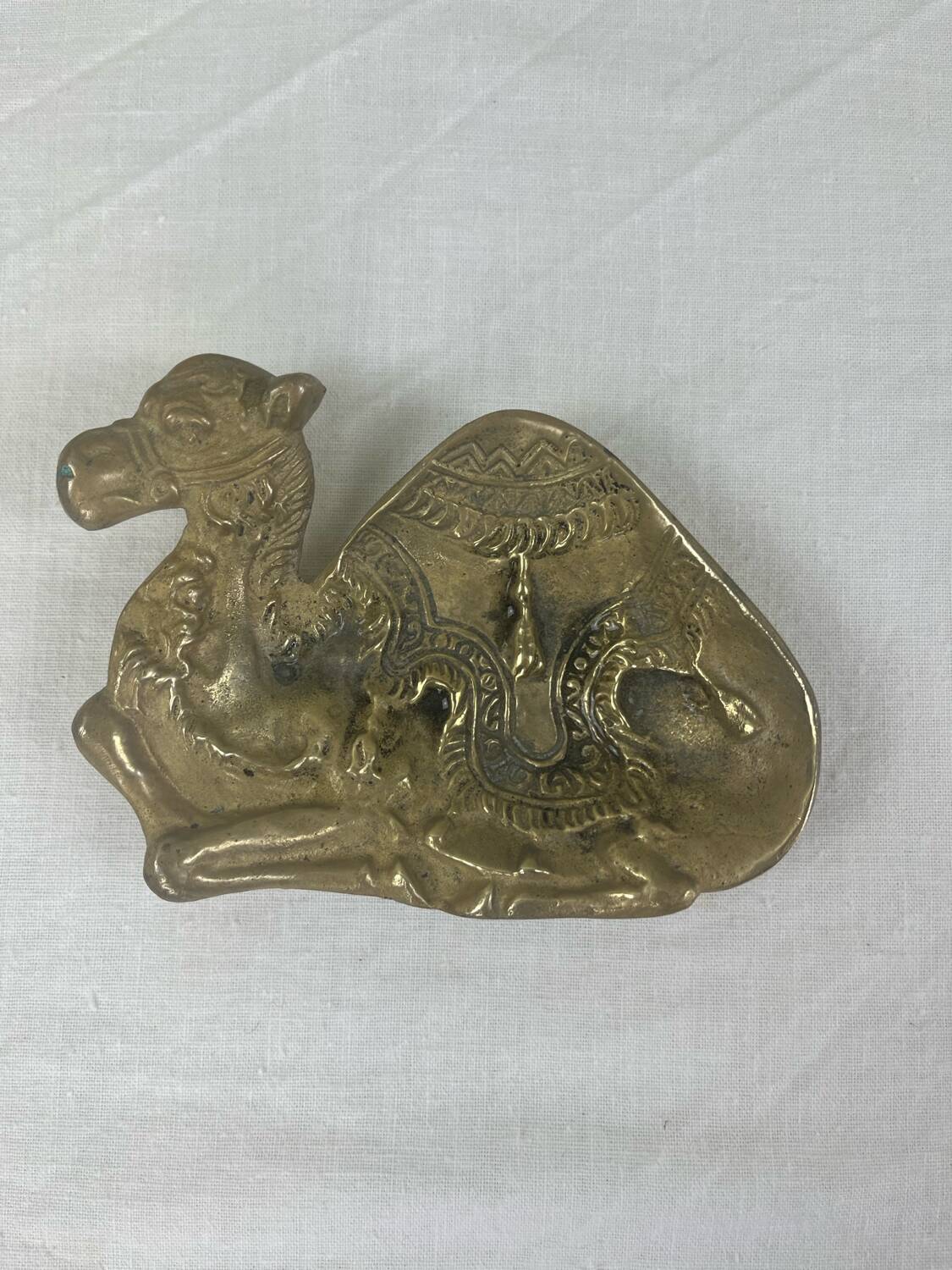 Brass pocket emptier