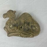 Brass pocket emptier