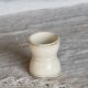 Antique egg cup, ironstone diabolo, ivory and gold edging