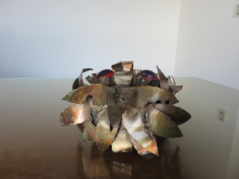 Owl in 1970s brutalist plate