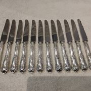 12 silver-plated dessert knives by Boulenger, Louis XV style, half-rich.